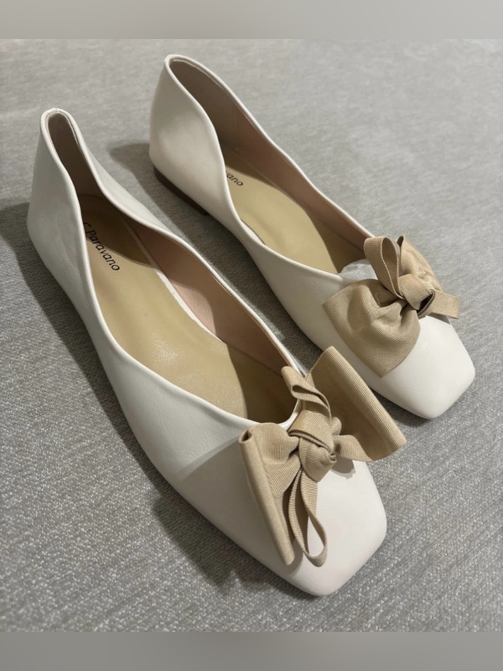 C. Paravano Cream Ballet Flats with Tan Bow Accent